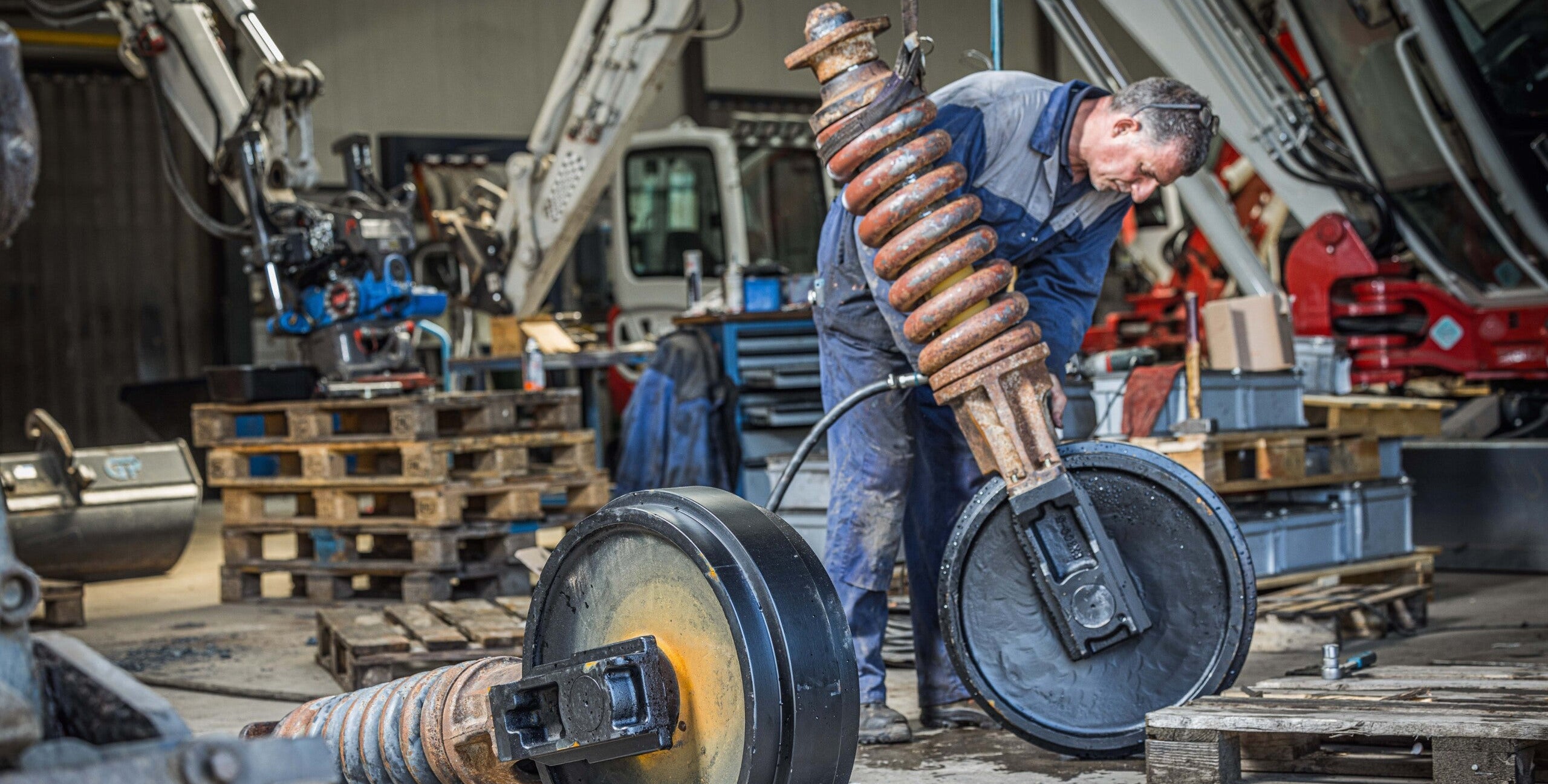 Werkstattservice Leitrad eines Takeuchis, Link führt zur Serviceseite