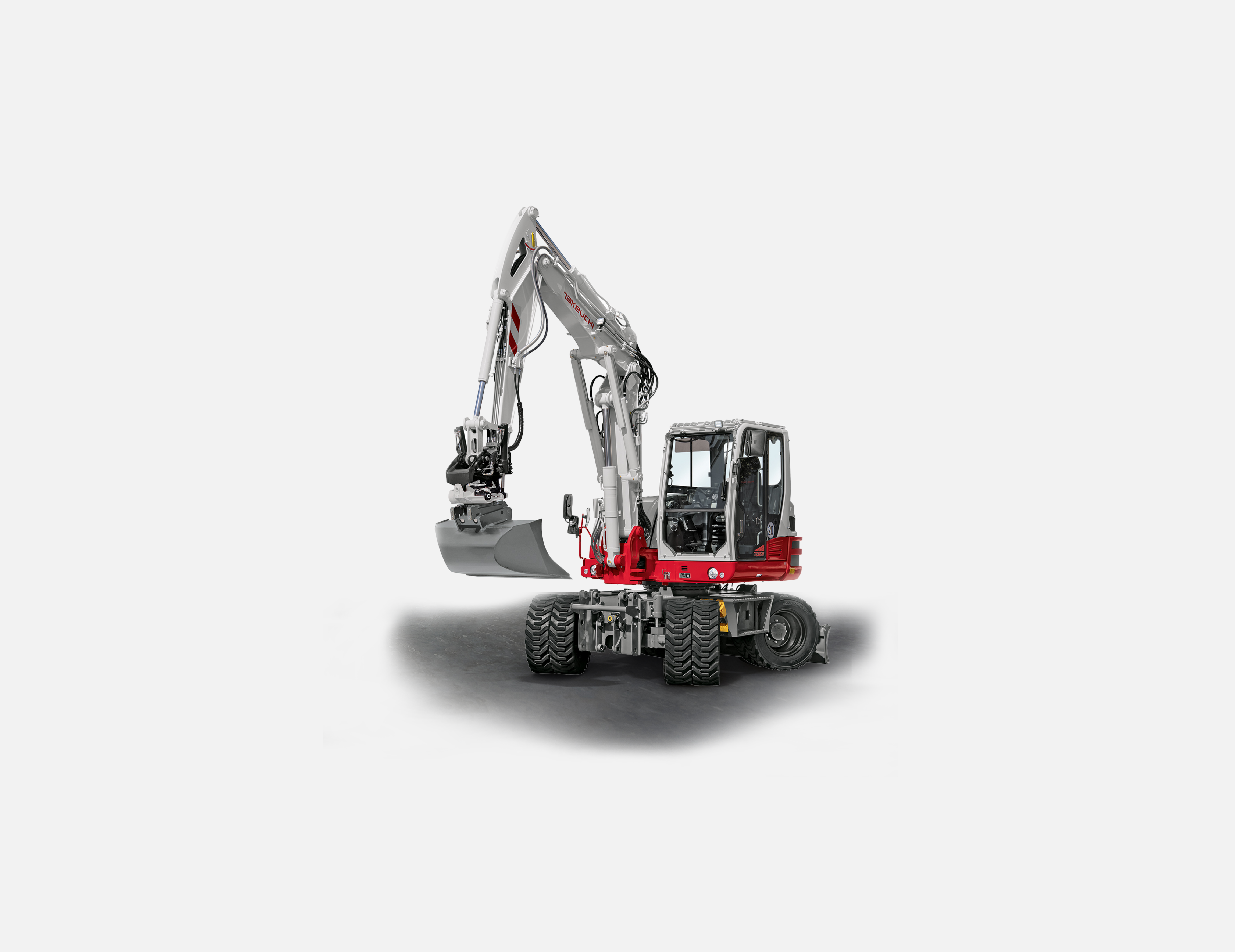 Takeuchi TB395W mobilbagger auf weißem Hintergrund